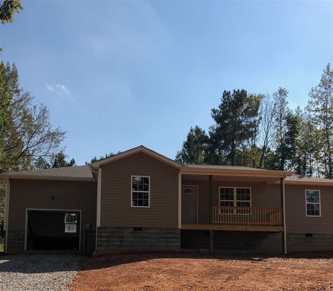 136 Fairview Road Athens, TN 37303 - Photo 1 of 1 a house that has tree in front of it