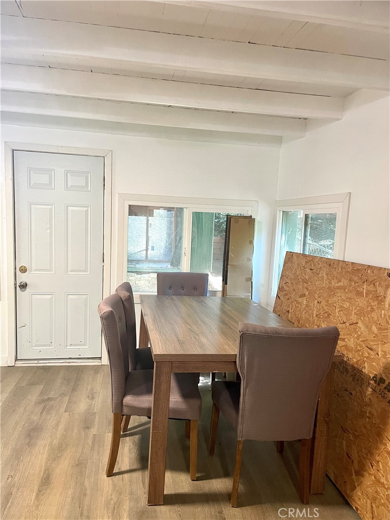 719 Woodland Road Crestline, CA 92325 - Photo 7 of 28 a view of a dining room with furniture