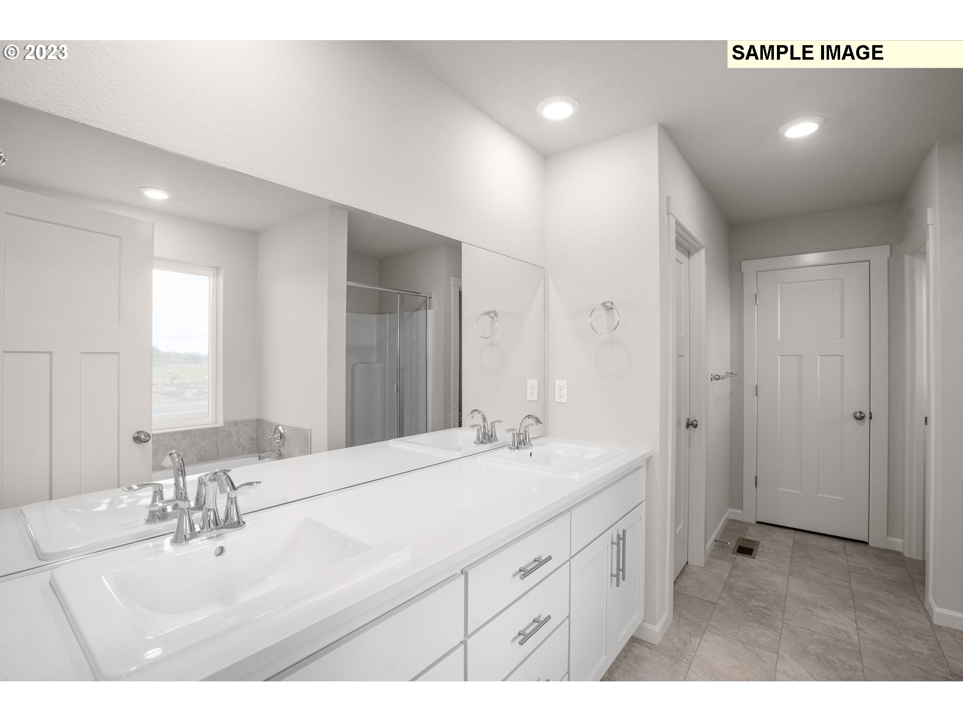 6286 Southeast 20th Street Gresham, OR 97080 - Photo 13 of 25 a bathroom with a sink double vanity and a mirror