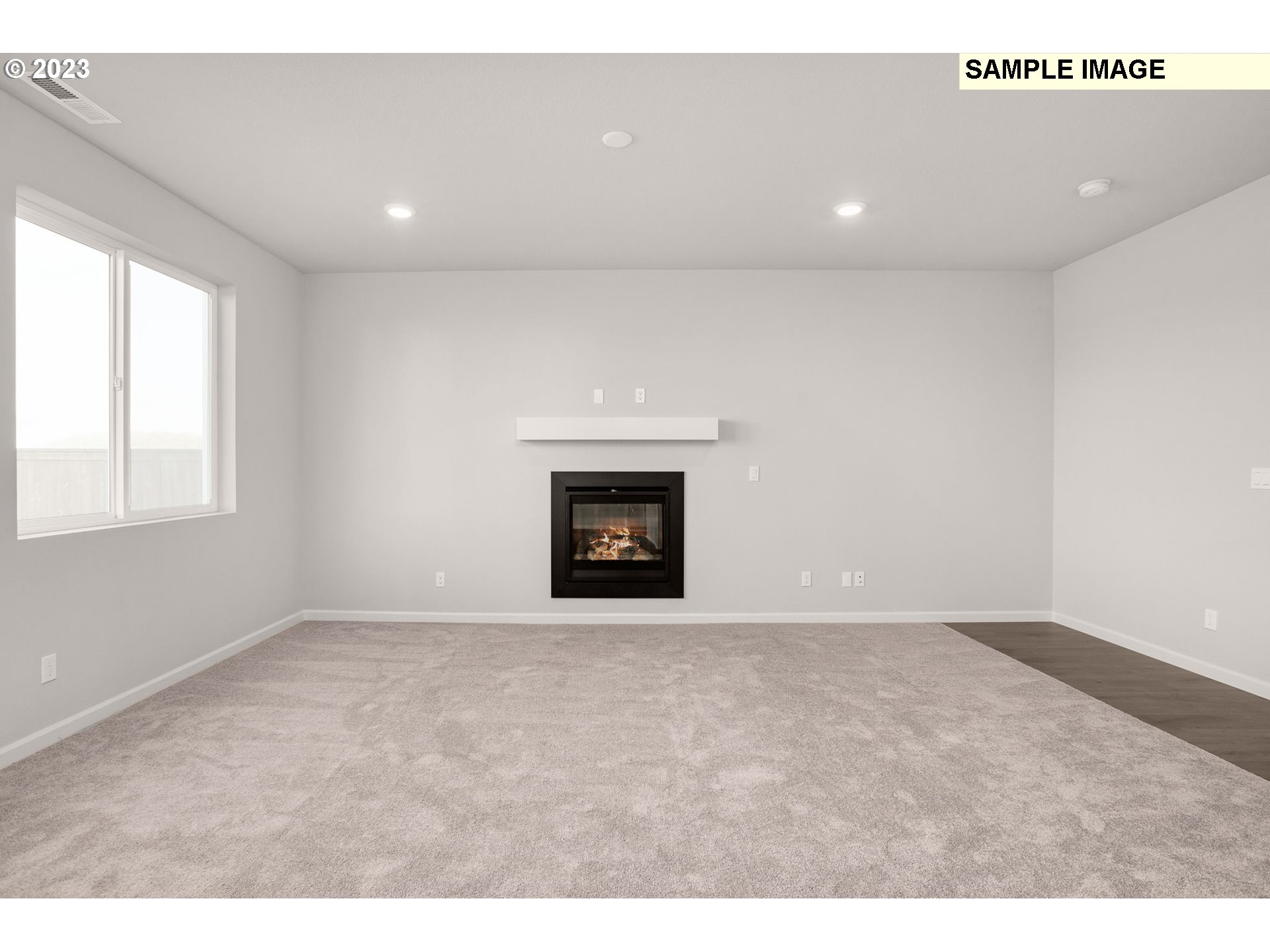 6286 Southeast 20th Street Gresham, OR 97080 - Photo 23 of 25 a view of an empty room with a fireplace and a window