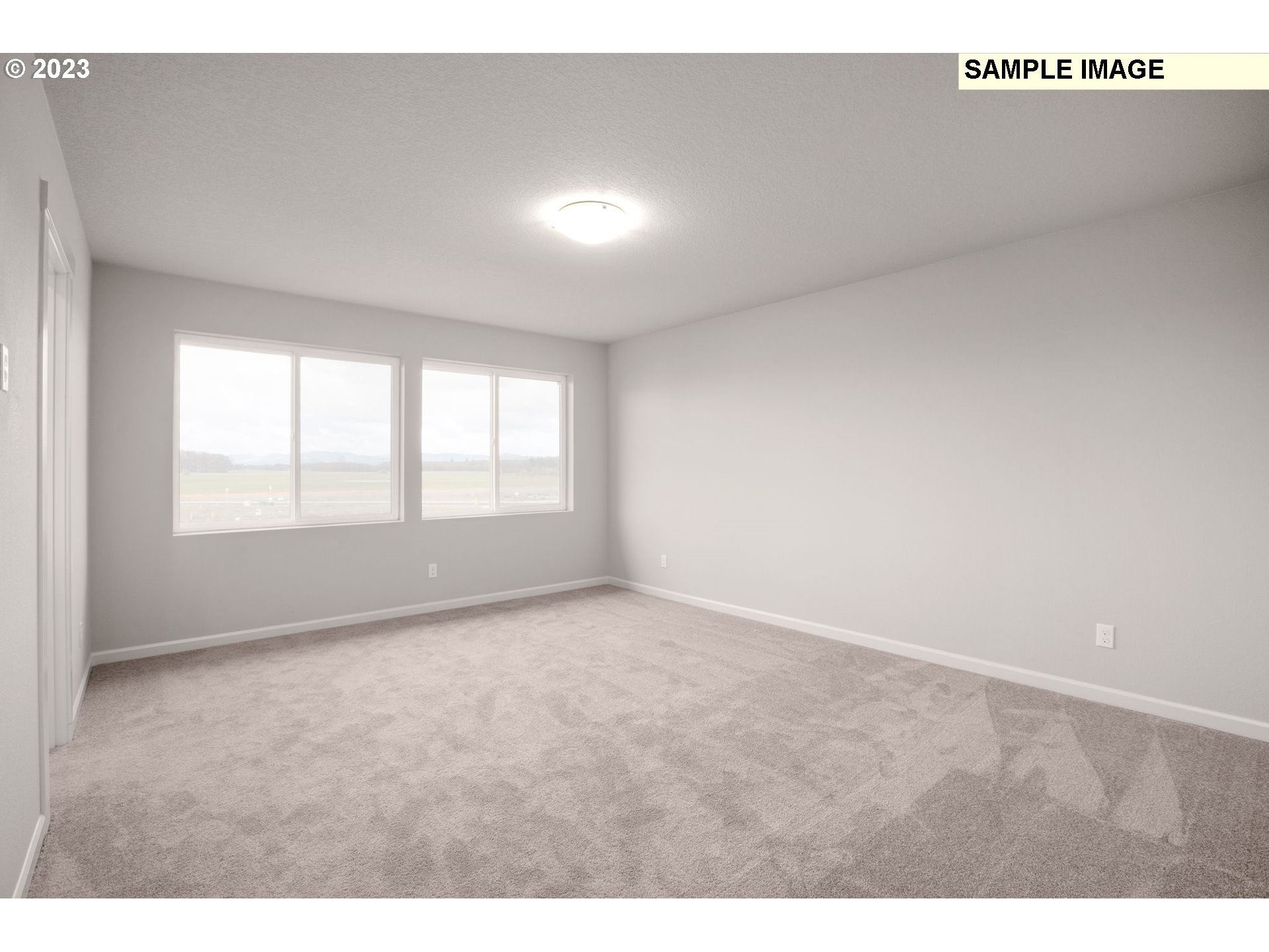 6286 Southeast 20th Street Gresham, OR 97080 - Photo 10 of 25 a view of an empty room with a window