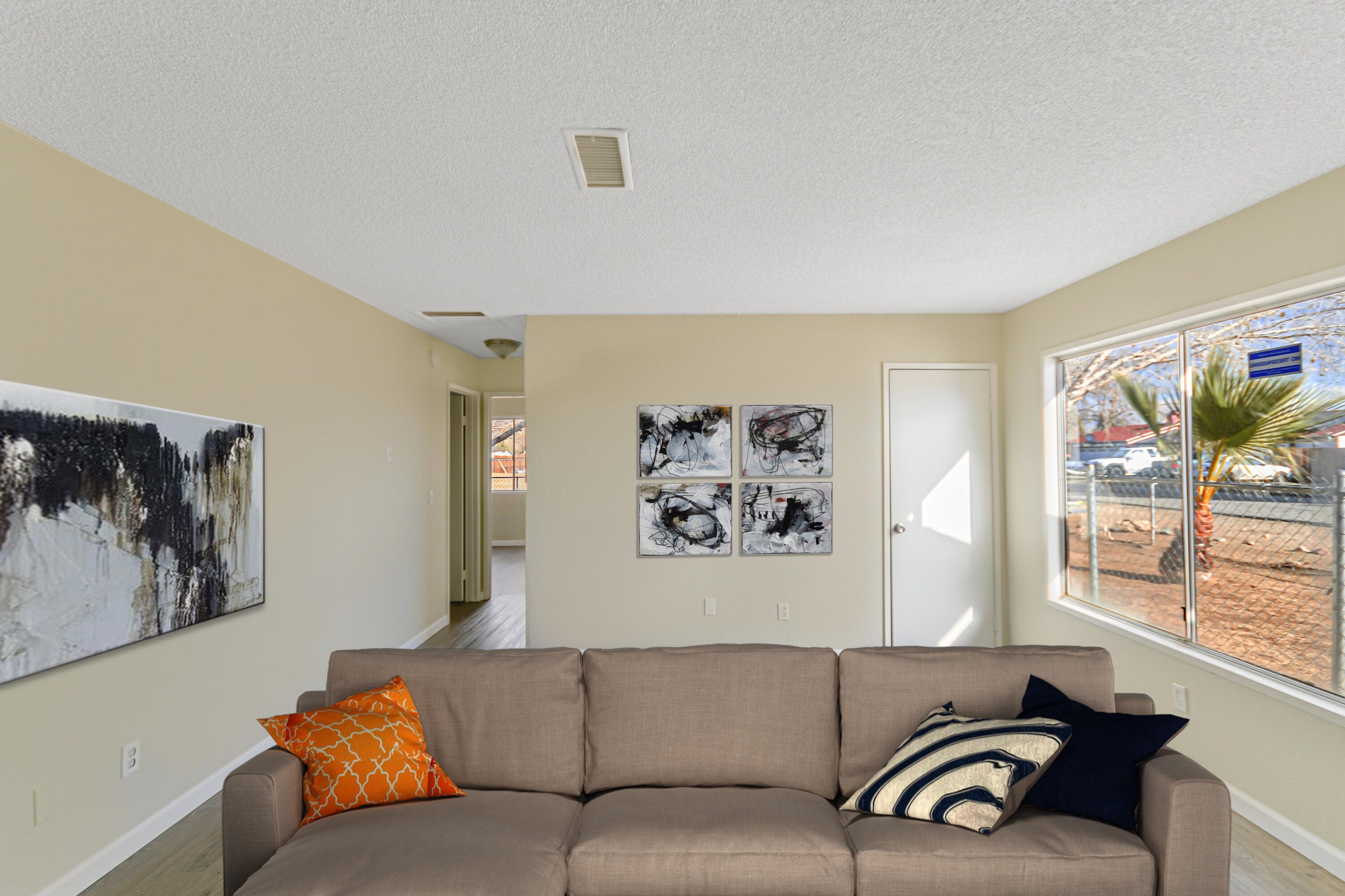 40611 178th Street East Lake Los Angeles, CA 93535 - Photo 4 of 14 a living room with furniture and a large window