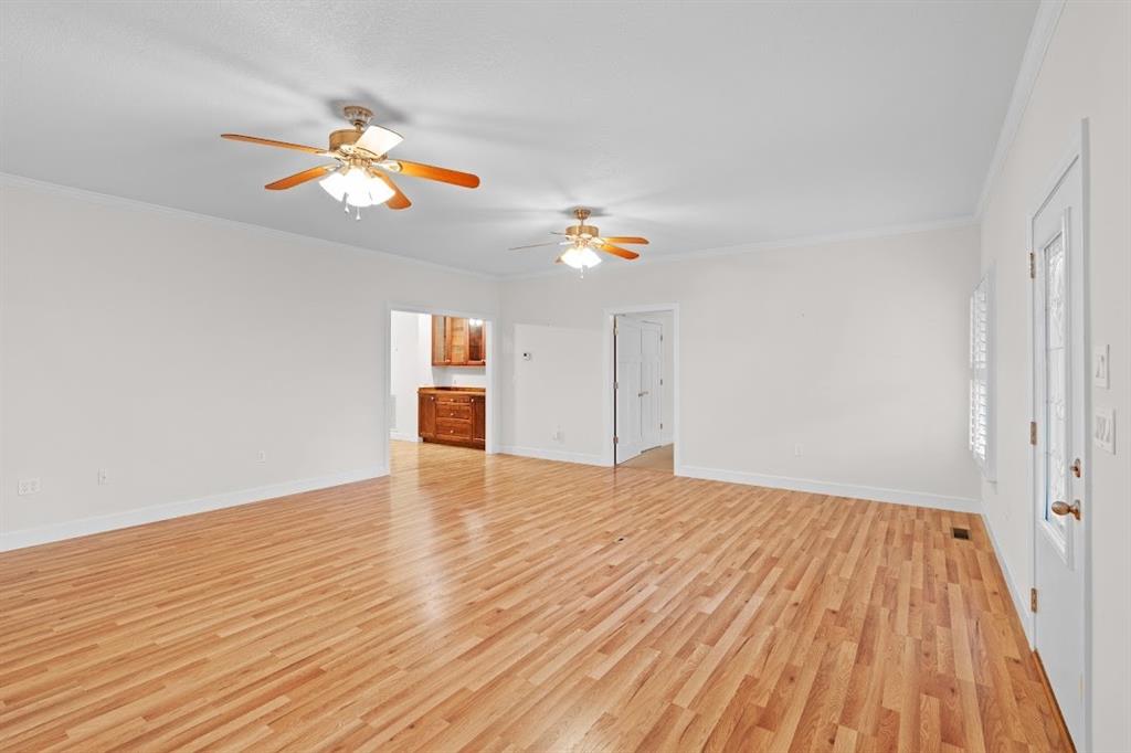 2239 Cross Roads Church Road Buchanan, GA 30113 - Photo 22 of 53 a view of empty room with wooden floor