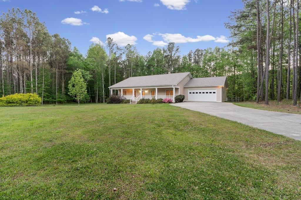2239 Cross Roads Church Road Buchanan, GA 30113 - Photo 3 of 53 a house view with a garden space