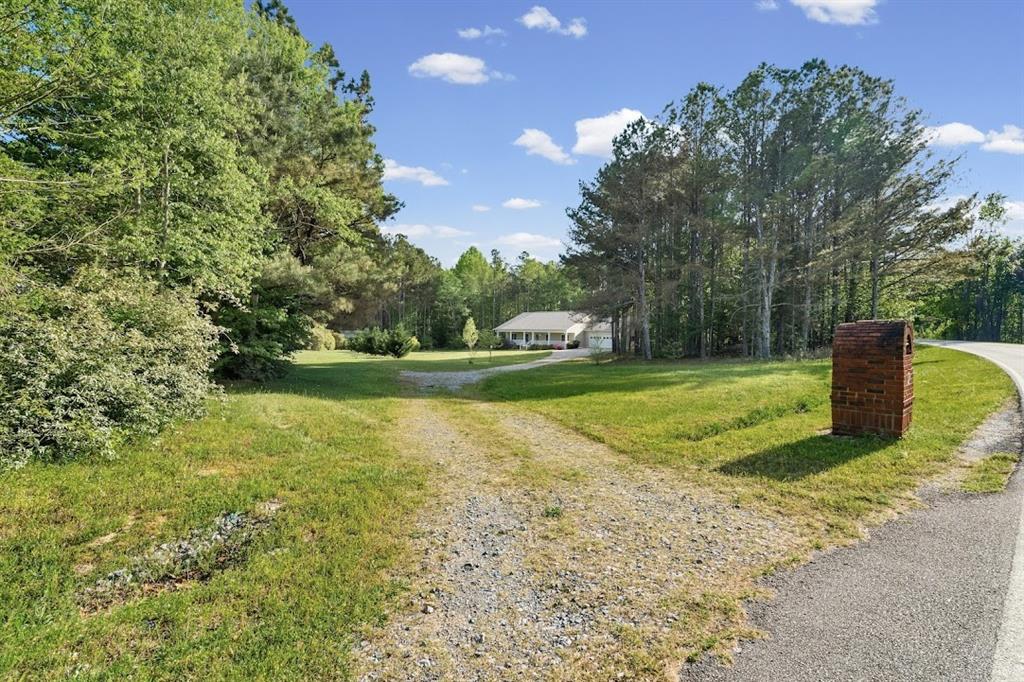2239 Cross Roads Church Road Buchanan, GA 30113 - Photo 4 of 53 a view of a garden with a slide