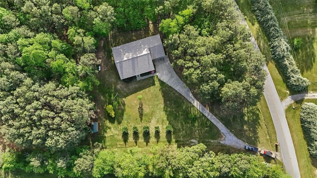 2239 Cross Roads Church Road Buchanan, GA 30113 - Photo 5 of 53 an aerial view of residential house with outdoor space and trees all around