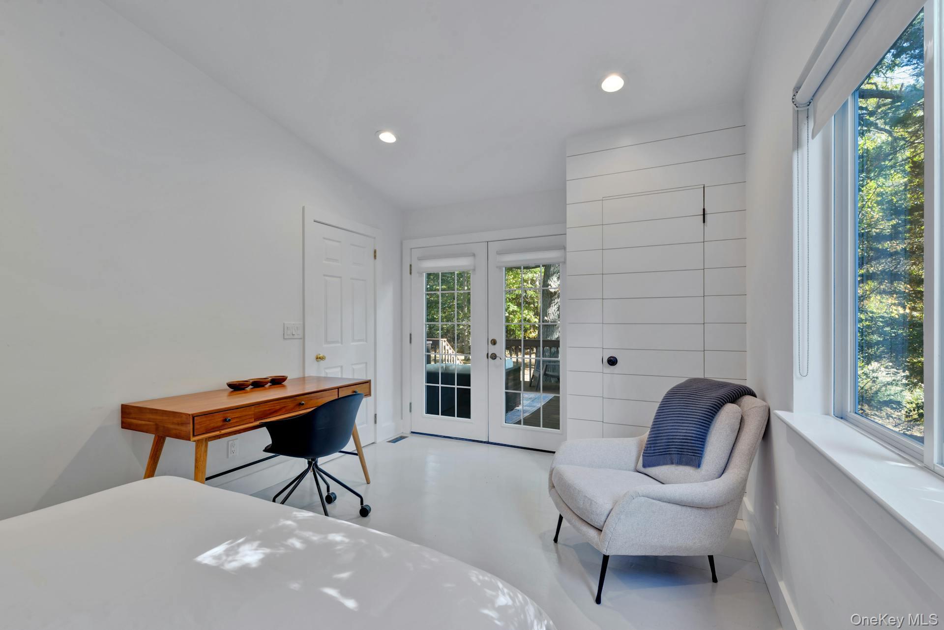 3670 Rocky Point Road East Marion, NY 11939 - Photo 16 of 27 a living room with furniture and a window