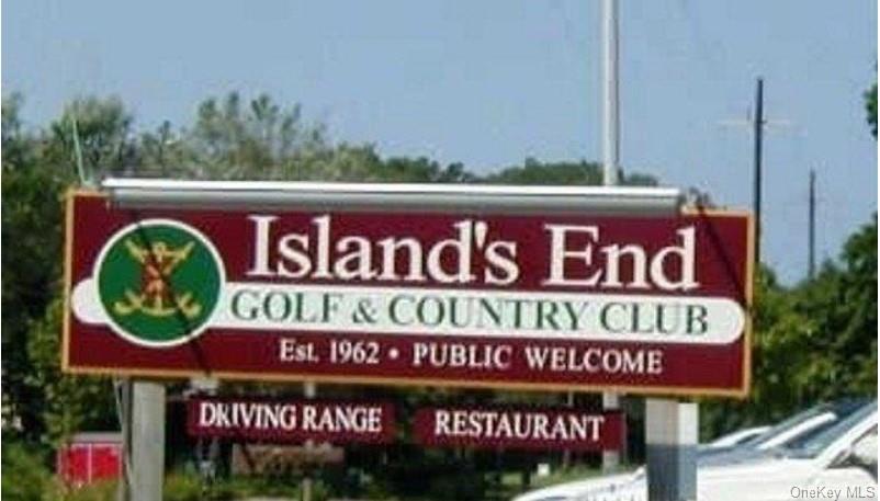 3670 Rocky Point Road East Marion, NY 11939 - Photo 25 of 27 a street sign on a pole on a street