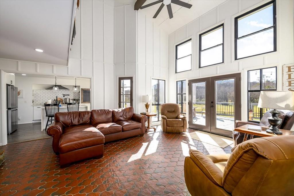 3274 Highway 255 Sautee Nacoochee, GA 30571 - Photo 12 of 77 a living room with furniture and a large window
