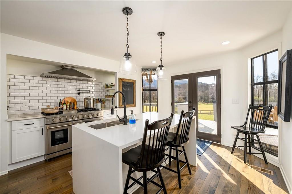 3274 Highway 255 Sautee Nacoochee, GA 30571 - Photo 17 of 77 a view of a dining room with furniture kitchen and wooden floor