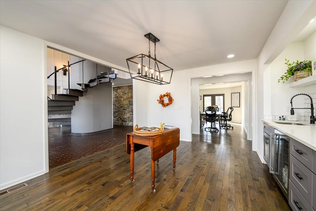 3274 Highway 255 Sautee Nacoochee, GA 30571 - Photo 22 of 77 a living room with furniture dining table and wooden floor