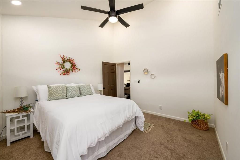 3274 Highway 255 Sautee Nacoochee, GA 30571 - Photo 39 of 77 a bedroom with a bed and a potted plant on the dresser