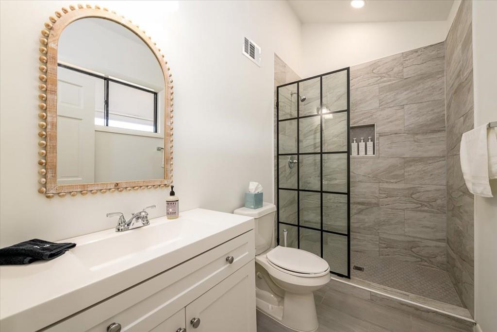 3274 Highway 255 Sautee Nacoochee, GA 30571 - Photo 40 of 77 a bathroom with a sink a toilet and shower