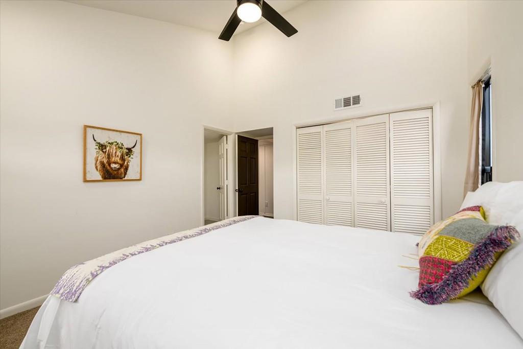 3274 Highway 255 Sautee Nacoochee, GA 30571 - Photo 46 of 77 a bedroom with a bed and a painting on the wall