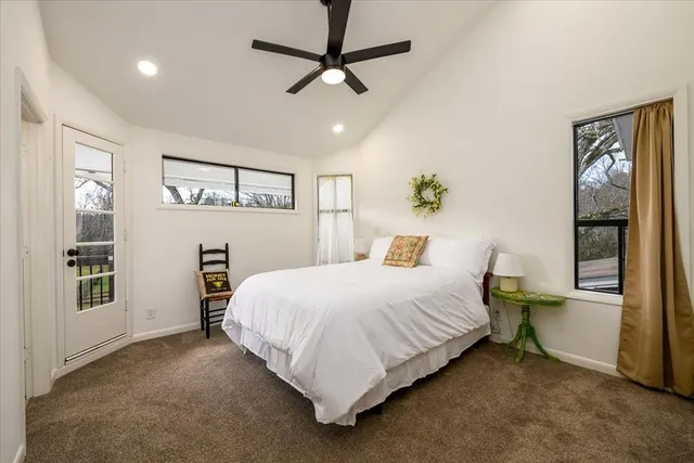 a view of a fountain in the backyard of a house