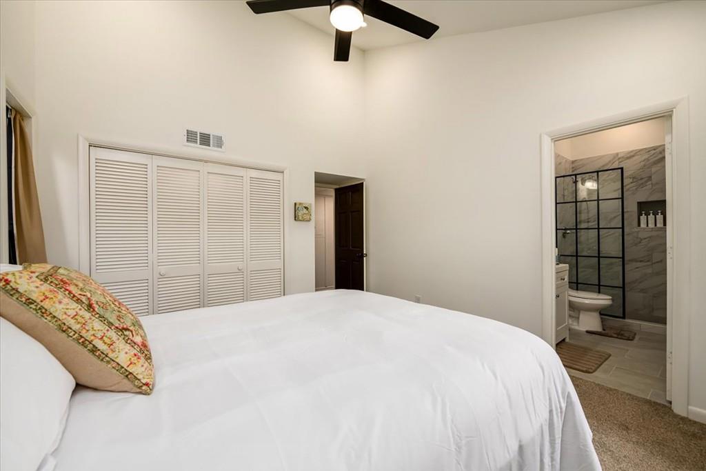 3274 Highway 255 Sautee Nacoochee, GA 30571 - Photo 50 of 77 a bedroom with a bed and a large mirror