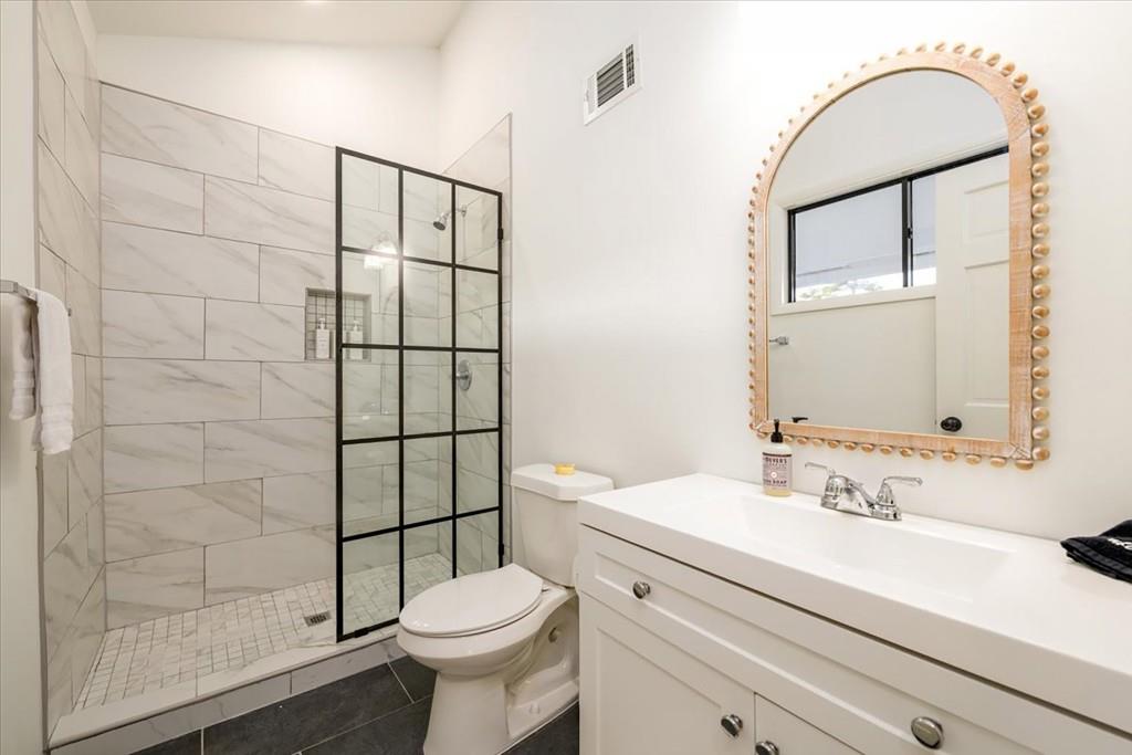 3274 Highway 255 Sautee Nacoochee, GA 30571 - Photo 59 of 77 a bathroom with a sink a toilet and shower