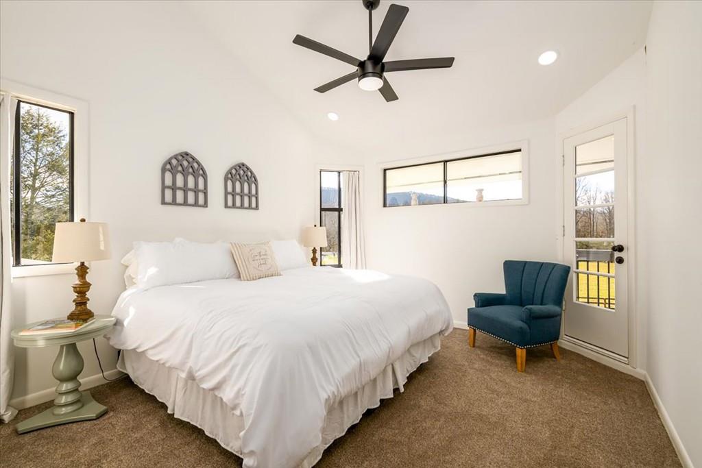 3274 Highway 255 Sautee Nacoochee, GA 30571 - Photo 63 of 77 a bedroom with a bed and a chair