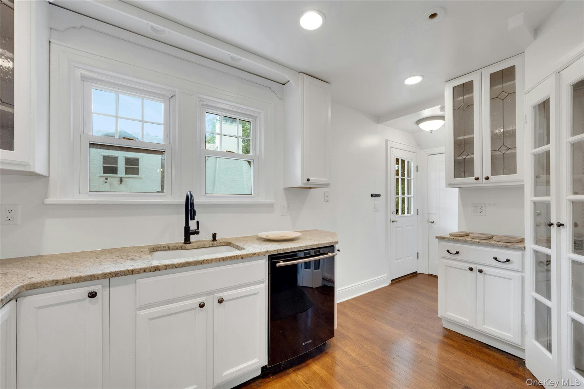 1179 Post Road Scarsdale, NY 10583 - Photo 7 of 24 Kitchen with French doors to generous pantry- open flow with easy access to both the living room and dining room.