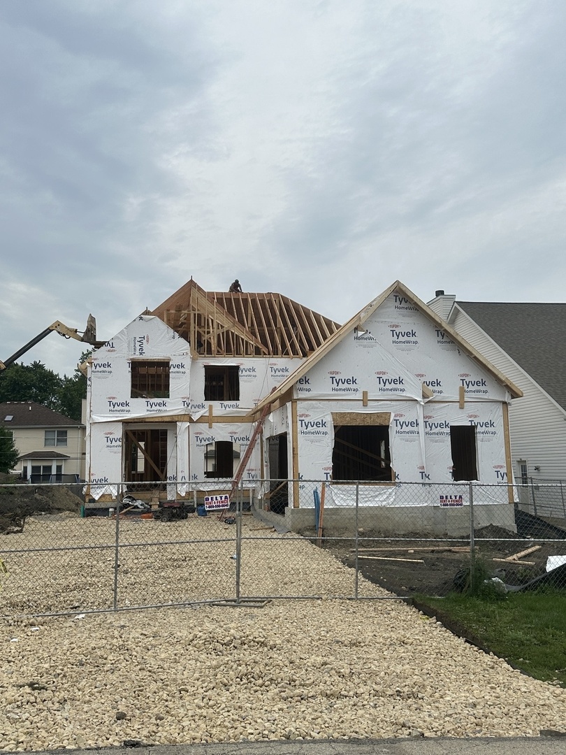 N720 Darling Street Wheaton, IL 60187 - Photo 6 of 10 a front view of a house with a yard