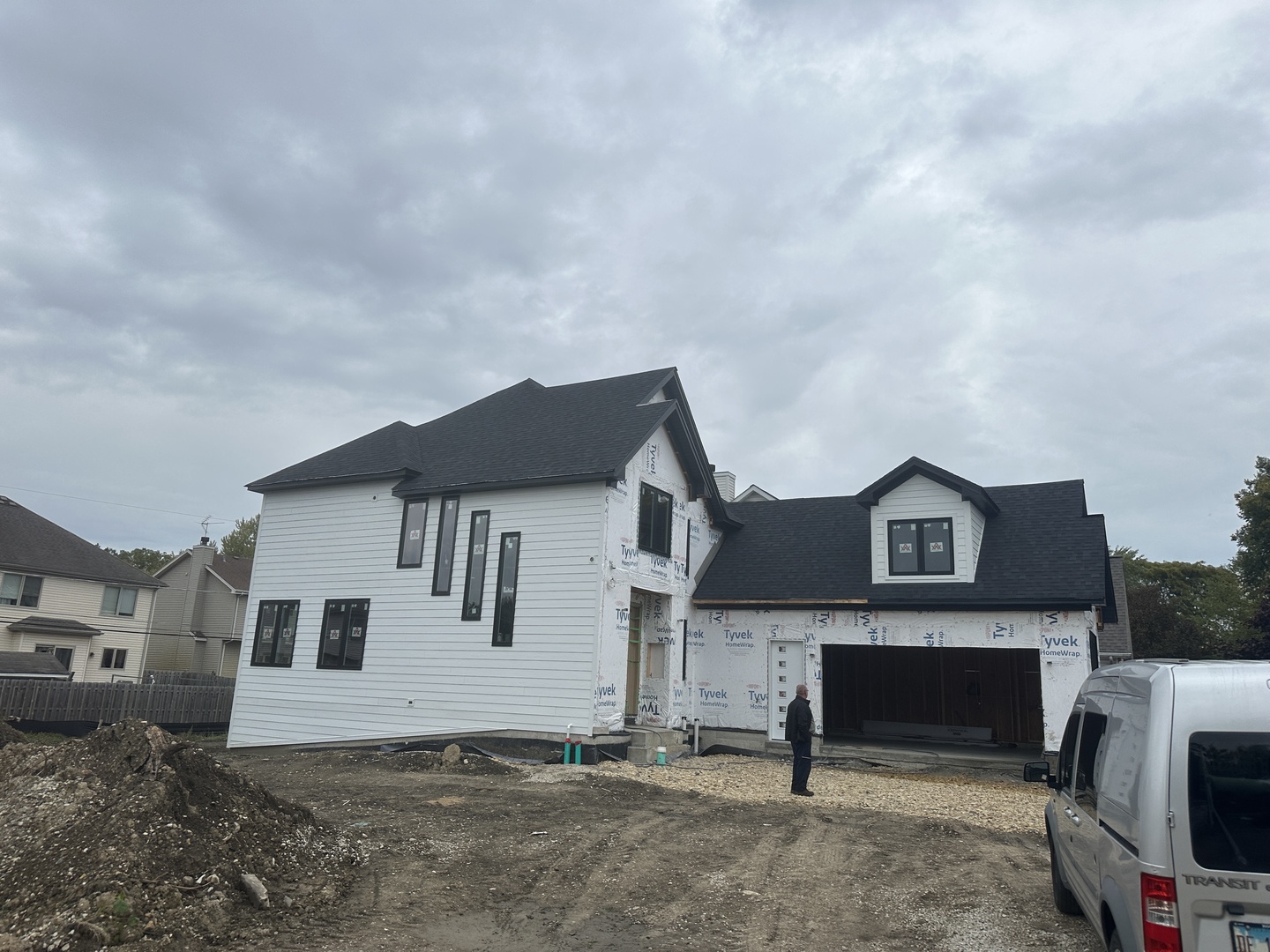 N720 Darling Street Wheaton, IL 60187 - Photo 8 of 10 a view of a house with a yard and garage