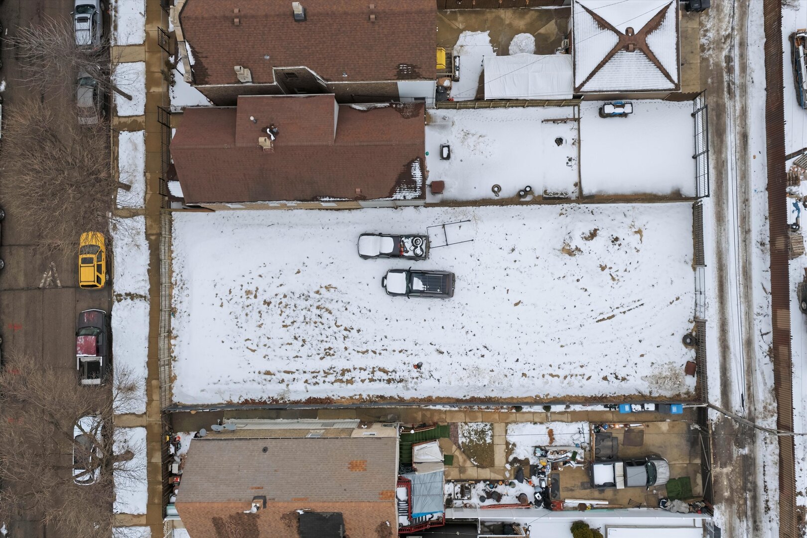 2838 South Troy Street Chicago, IL 60623 - Photo 4 of 5 an aerial view of residential houses with parking