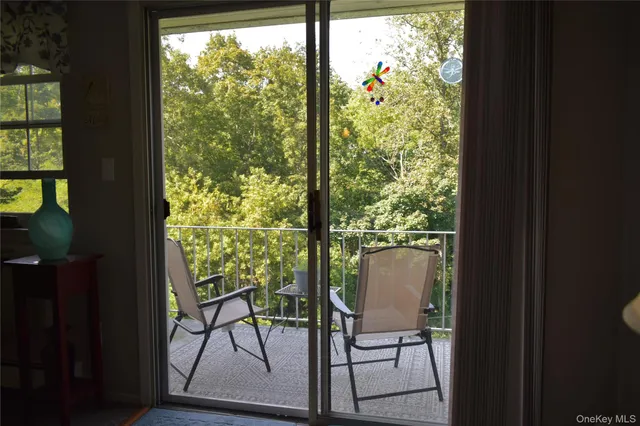 a bed room with a bed and window