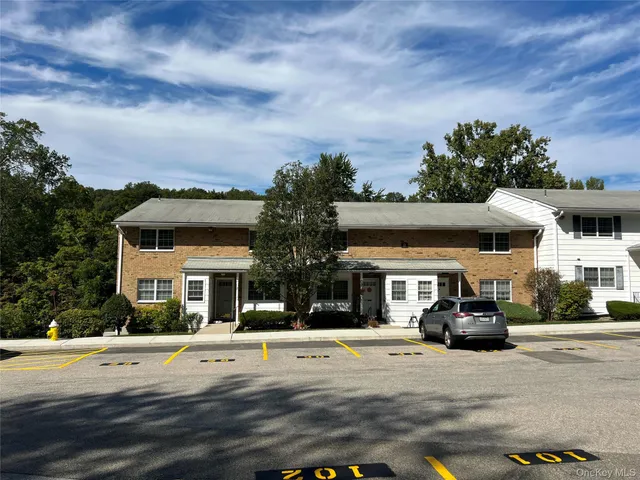 a car parked in front of a building