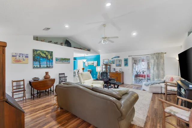 a spacious bathroom with a sink double vanity and a mirror