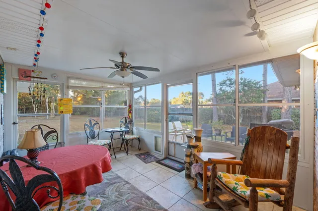 a kitchen with white cabinets stainless steel appliances and sink