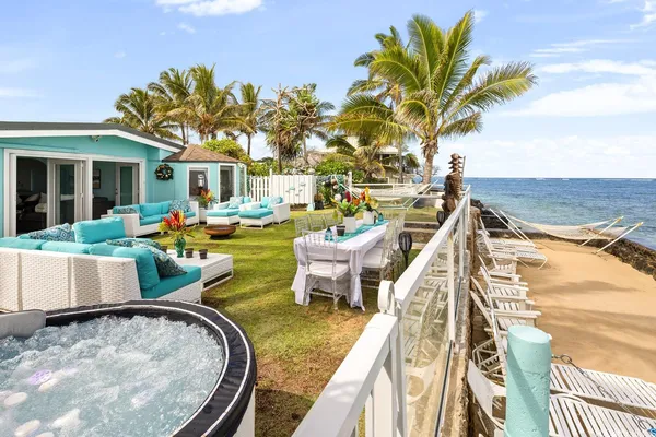 swimming pool view with a seating space