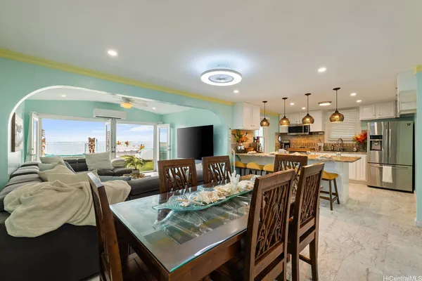 a view of a dining room with furniture