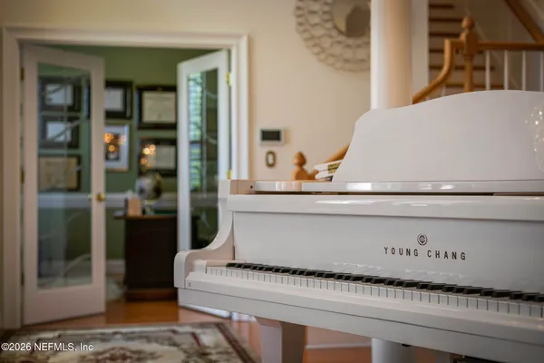 a view of a dining room with furniture window and outside view