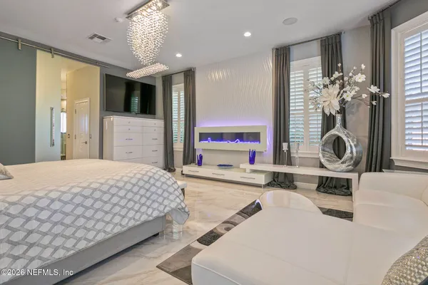 a view of a living room and dining room