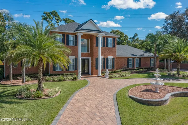 a view of a house with a swimming pool