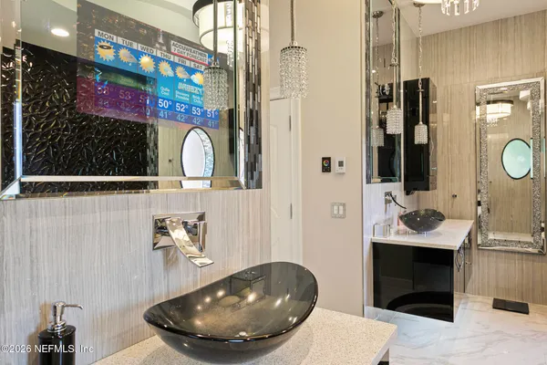 a front view of a house with a yard table and chairs