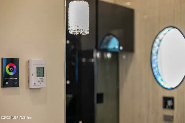 a front view of a house with yard and green space