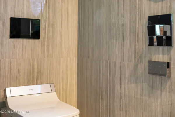 a view of a swimming pool with patio