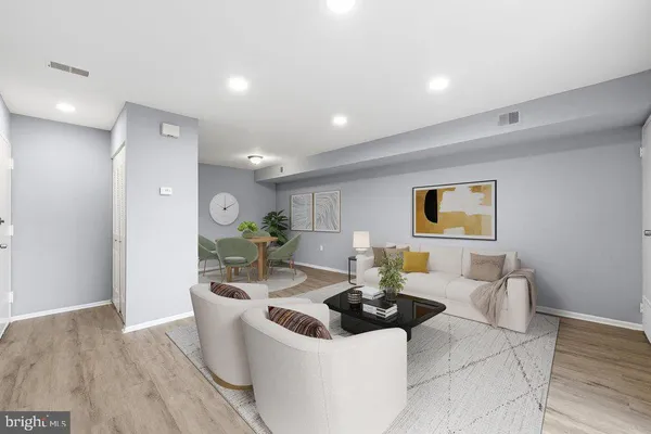 a living room with a couch and a table