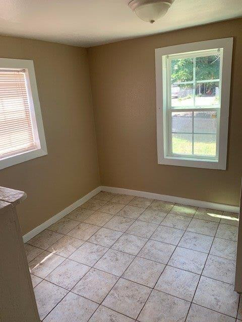 3014 Duke Street Lubbock, TX 79415 - Photo 5 of 10 a view of a livingroom with a window