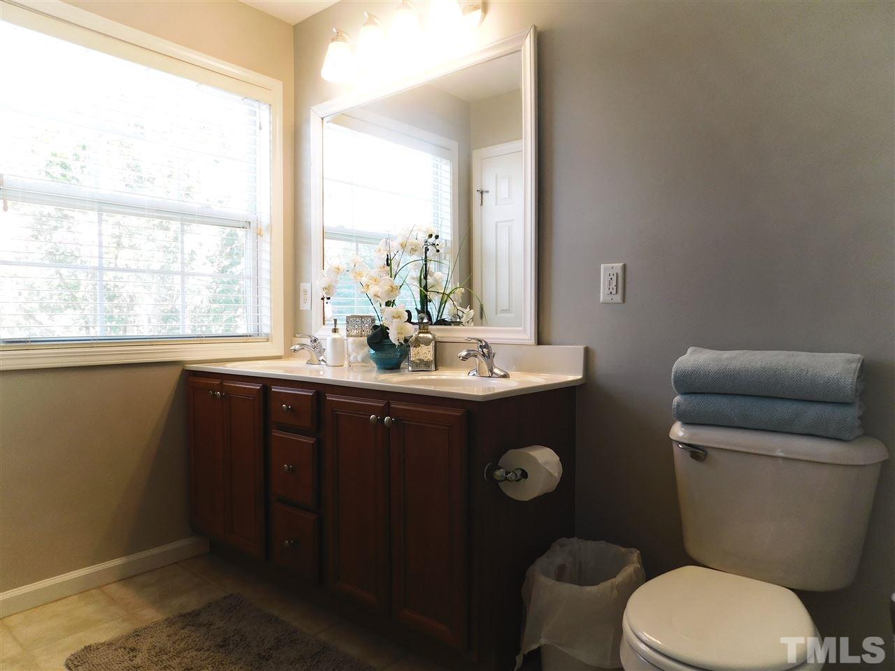 2110 Piney Brook Road, Unit 106 Raleigh, NC 27614 - Photo 10 of 17 Tile, New light fixture