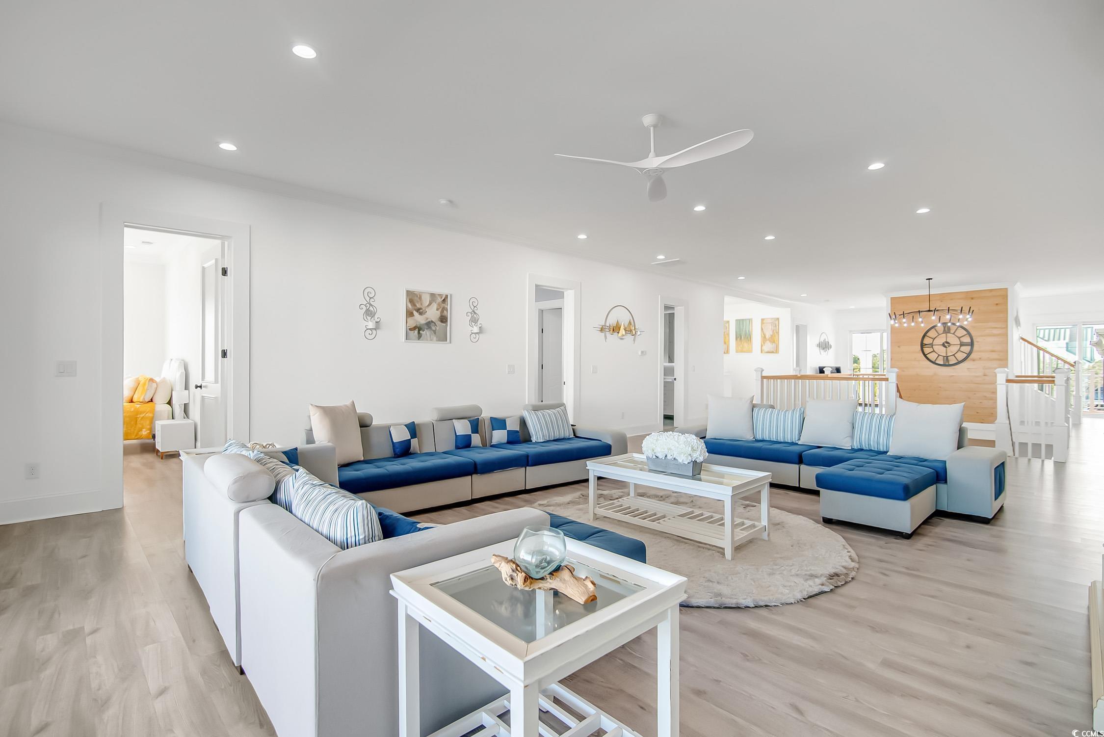 139 Pioneer Loop Georgetown, SC 29440 - Photo 27 of 39 Living room featuring recessed lighting, light wood-type flooring, and a ceiling fan