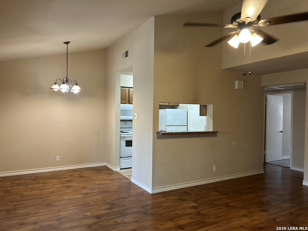 13018 Heimer Road, Unit 710 San Antonio, TX 78216 - Photo 8 of 27 an empty room with wooden floor and ceiling fan