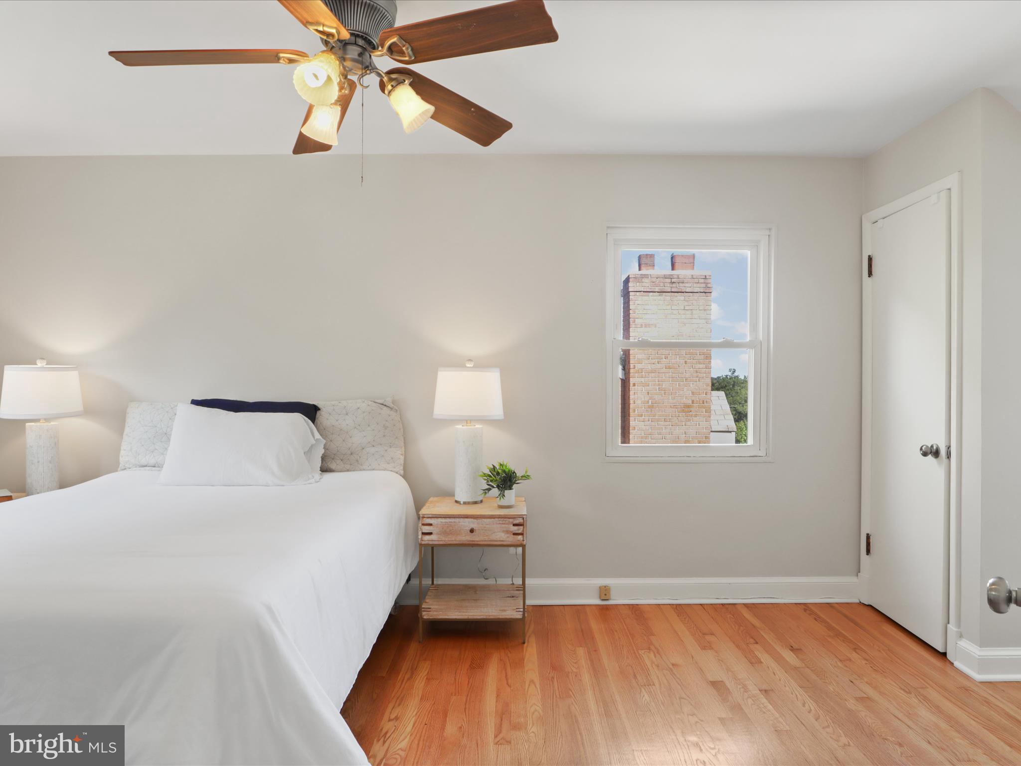 3106 63rd Place Cheverly, MD 20785 - Photo 14 of 42 a bedroom with a bed and a window