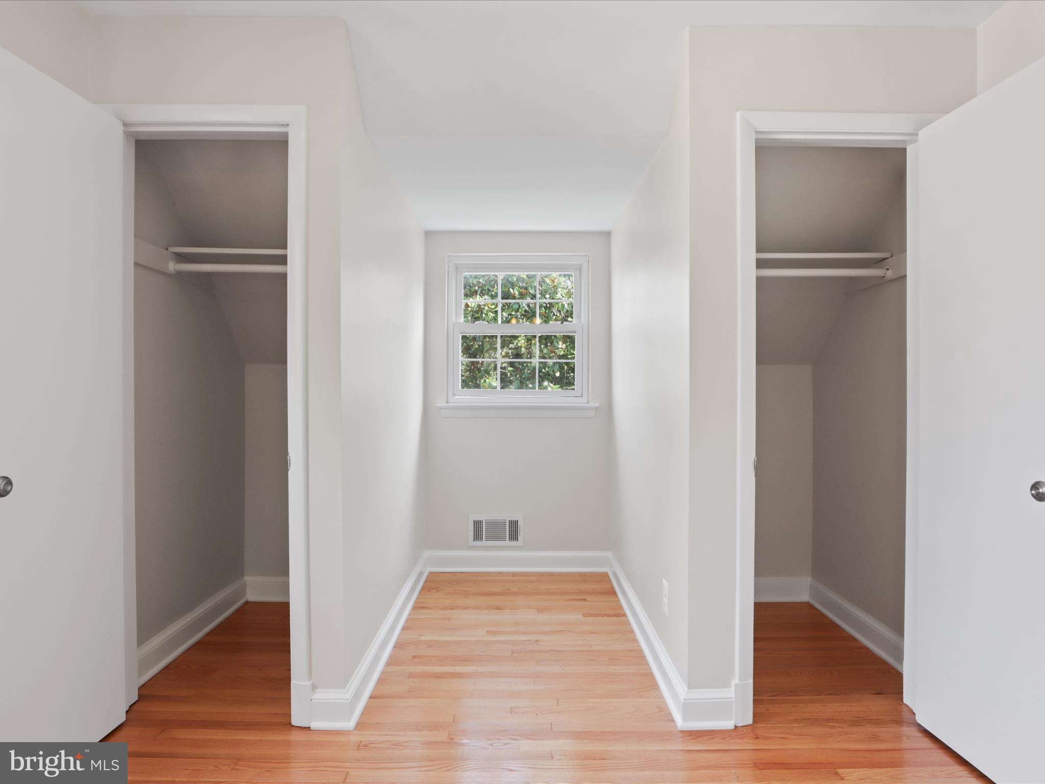 3106 63rd Place Cheverly, MD 20785 - Photo 15 of 42 a view of room with window and wooden floor