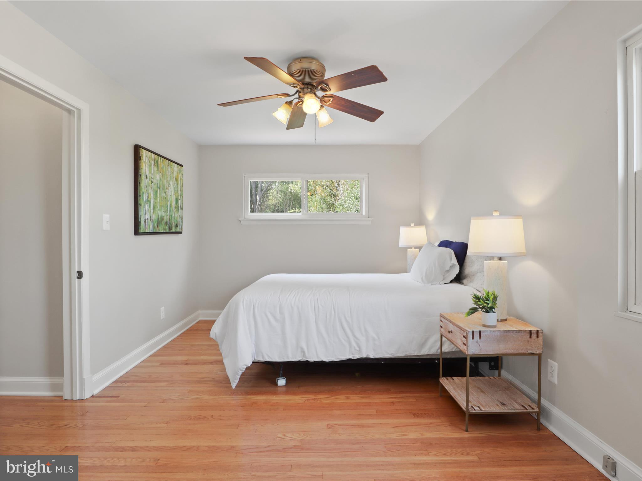 3106 63rd Place Cheverly, MD 20785 - Photo 16 of 42 a bedroom with a bed and window