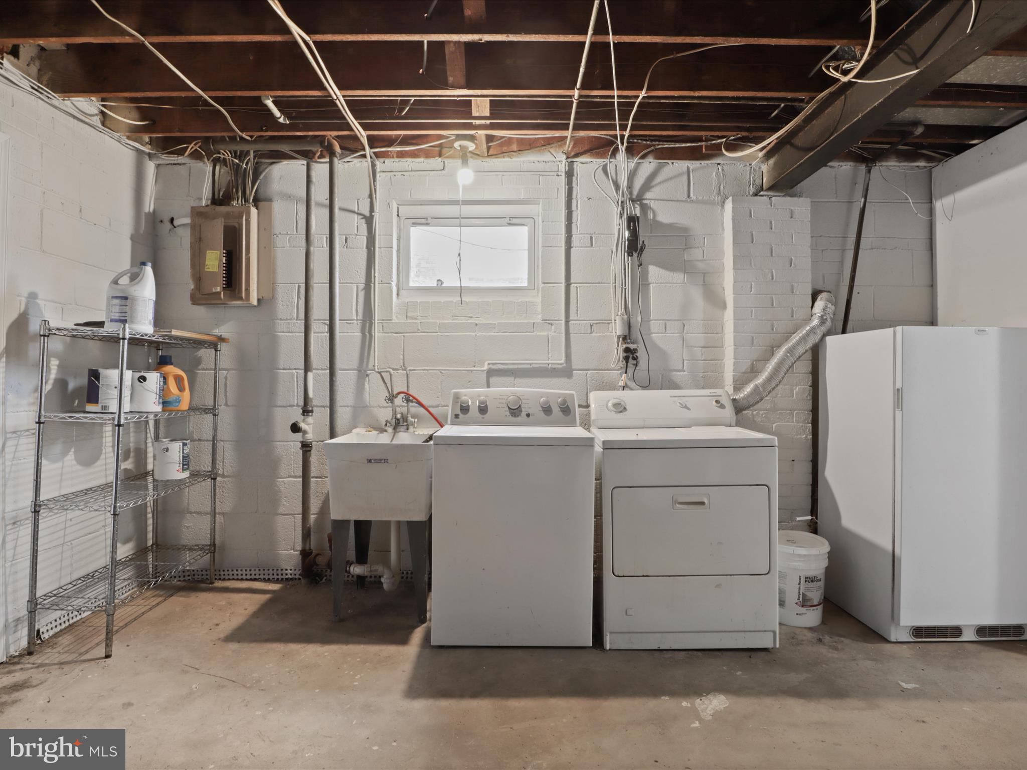 3106 63rd Place Cheverly, MD 20785 - Photo 29 of 42 a utility room with dryer and washer
