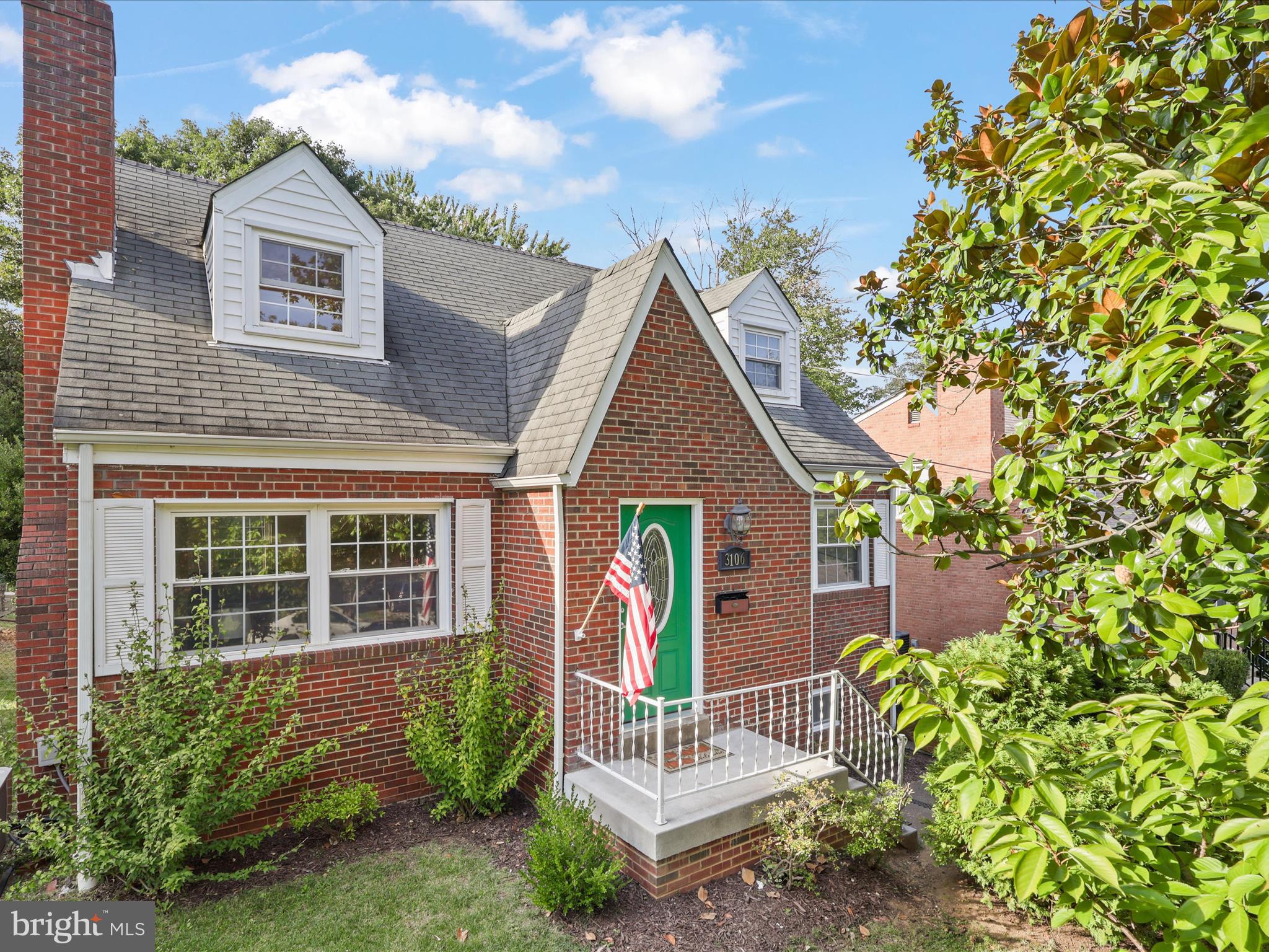 3106 63rd Place Cheverly, MD 20785 - Photo 4 of 42 a view of house with a yard and a garden