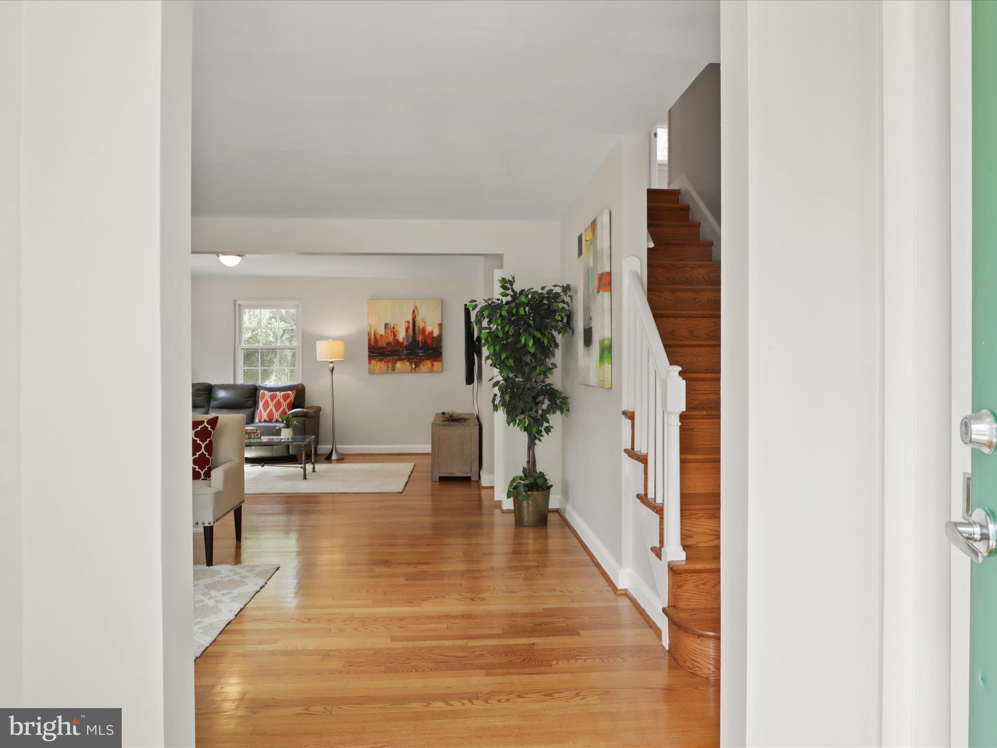 3106 63rd Place Cheverly, MD 20785 - Photo 5 of 42 a living room with furniture and a wooden floor