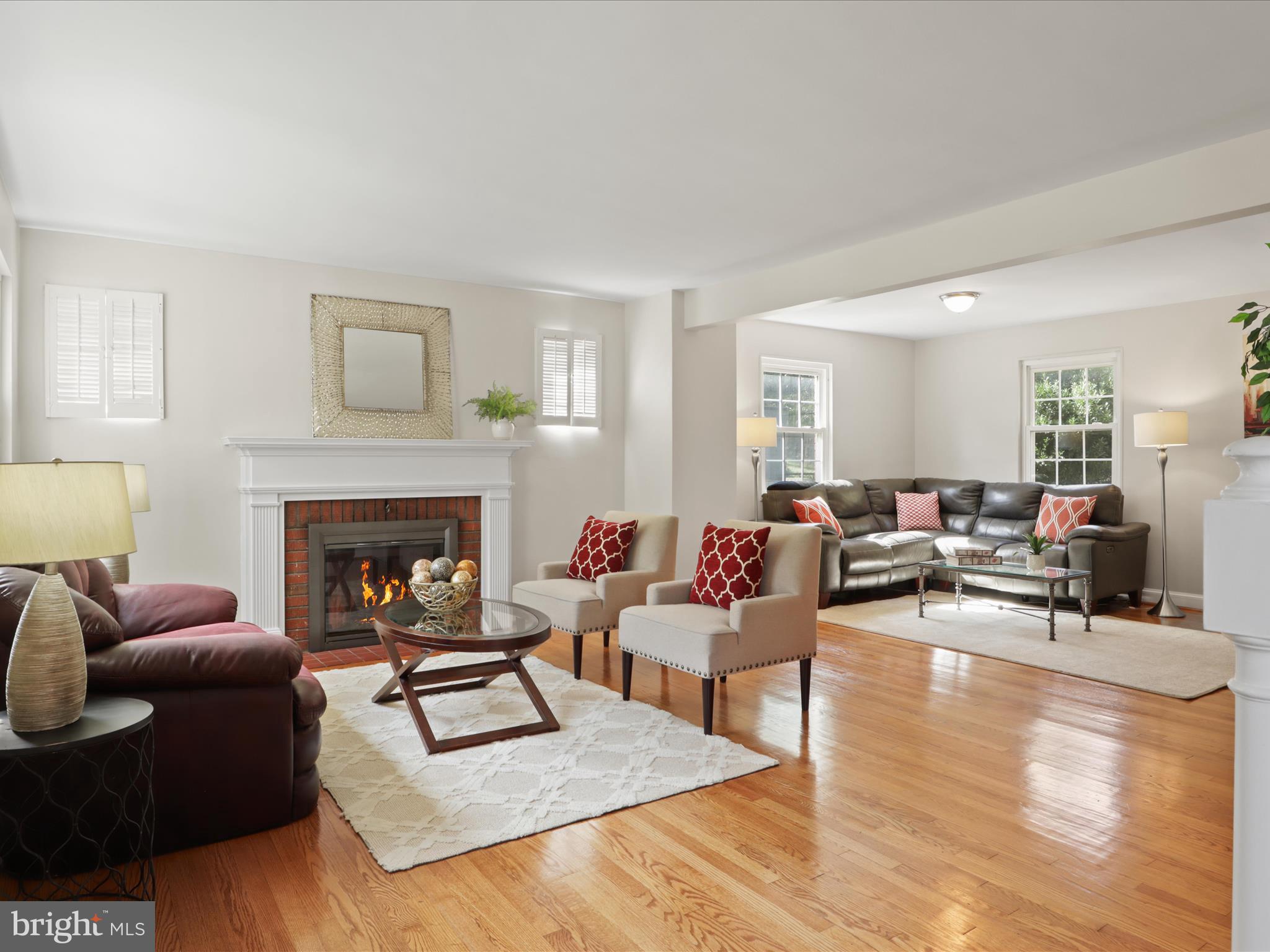 3106 63rd Place Cheverly, MD 20785 - Photo 6 of 42 a living room with furniture and a fireplace
